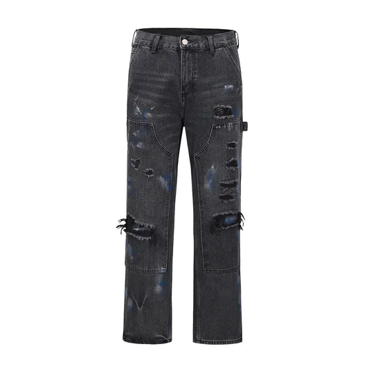 Ripped Black Zip-Up Jeans with Washed Ink Splatter